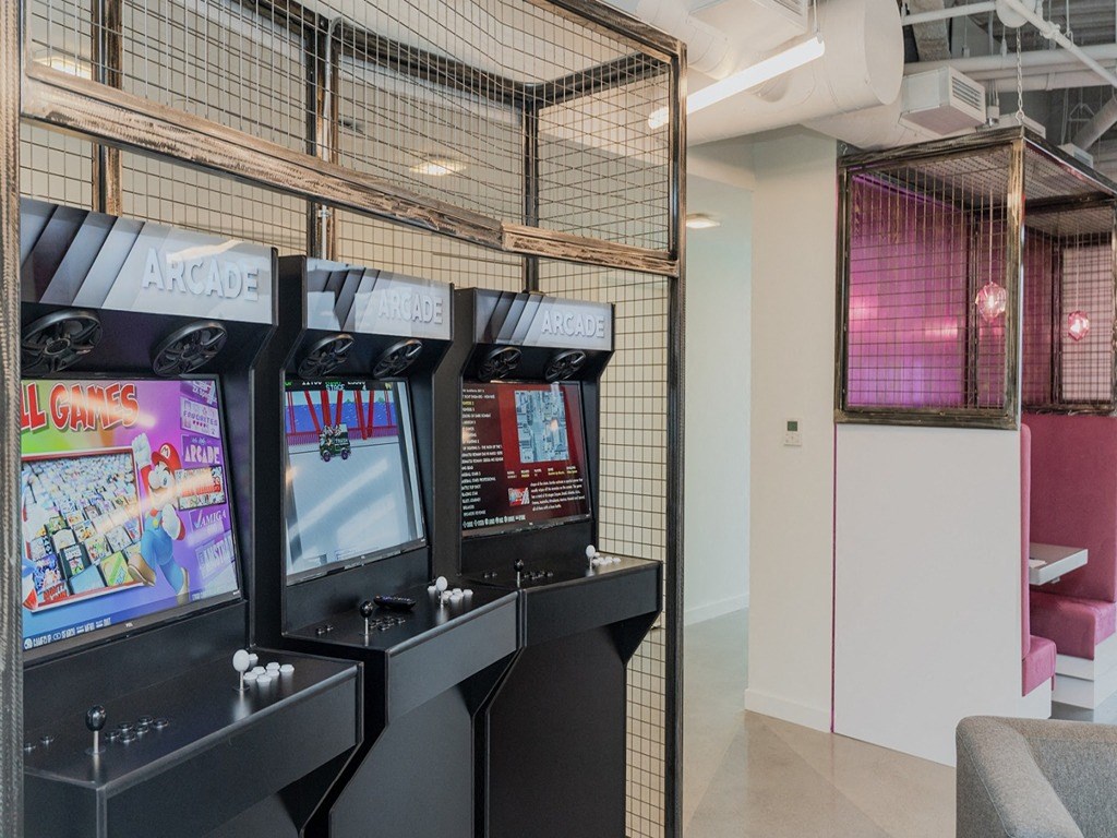 a group of video game consoles in a room
